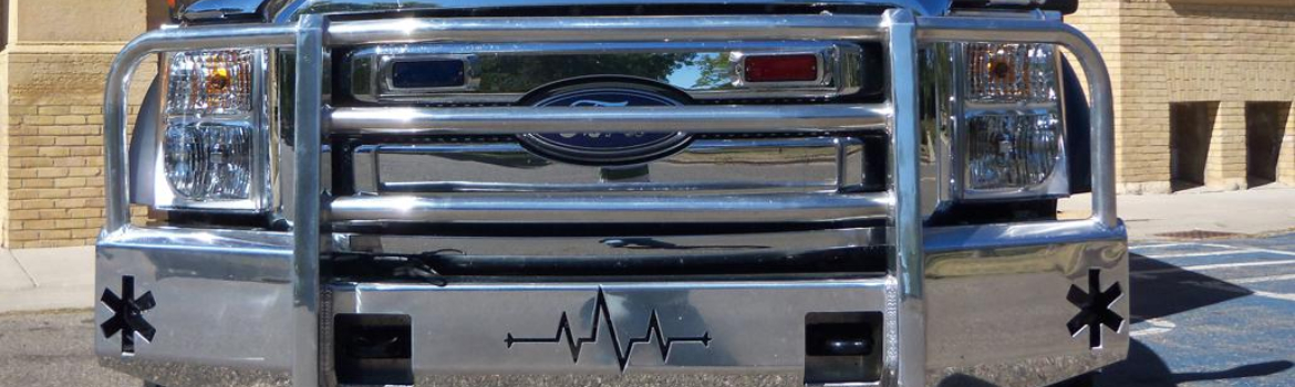 A Ford Emergency Truck with a custom aluminum bumper.